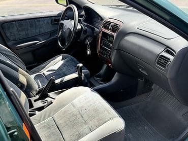 mitsubishi eclipse: Mazda 626: 1997 г., 1.8 л, Механика, Бензин, Седан — 8