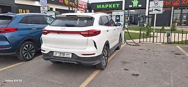 mazda 121: Электромобиль кроссовер (белый), купеобразный силуэт. Основные — 3