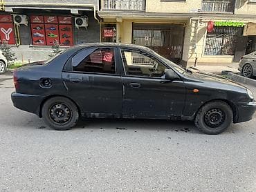 даево: Daewoo Lanos: 2009 г., Ручные, Бензин, Седан — 2