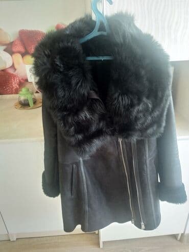 Новая женская натуральная дублёнка,с капюшоном. Длина закрывает