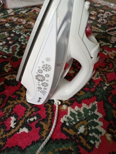 gps приемник: Утюг Vitek, Паровой, Керамический, Вертикальное отпаривание — 1