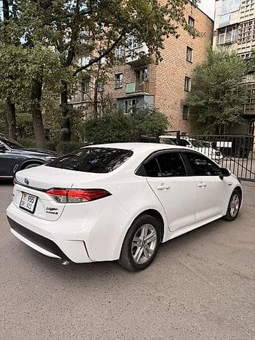 corolla e120: Toyota Corolla: 2022 г., 1.8 л, Автомат, Гибрид, Седан — 2