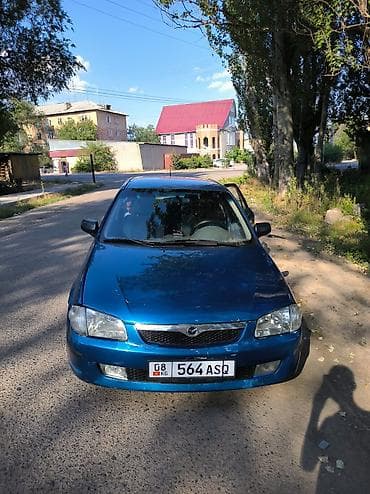 Mazda 323: 1999 г., 1.5 л, Механика, Бензин, Универсал