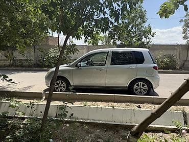 Mazda Demio: 2002 г., 1.3 л, Автомат, Бензин, Хетчбек — 5
