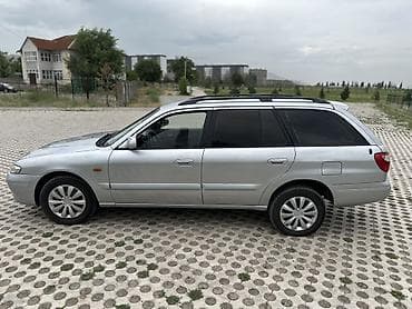 1 mz: Mazda 626: 2000 г., 2 л, Механика, Газ, Универсал — 5
