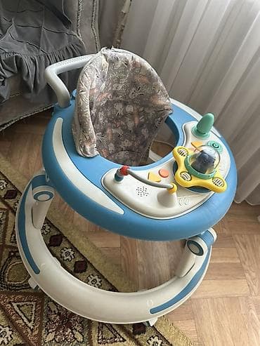 Продаются детские ходунки с игровой панелью