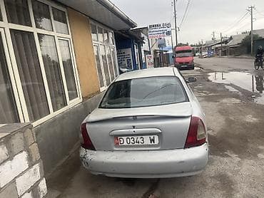 Daihatsu : 2004 г., 1.5 л, Механика, Бензин, Седан — 2