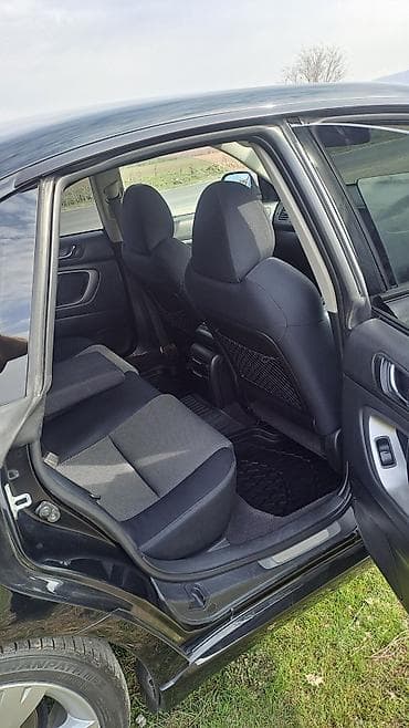 sym: Subaru Legacy: 2004 г., Седан — 7