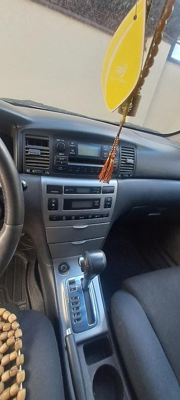 2005: Toyota Corolla: 2005 г., Бензин, Универсал — 9