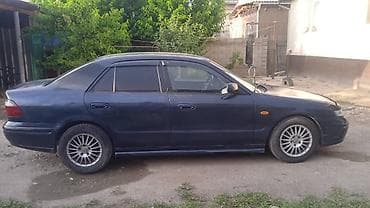 резиновые трубы: Mazda 626: 1998 г., 1.8 л, Механика, Бензин, Седан — 2