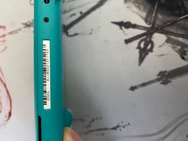 nvidia shield portable: Nintendo Switch Lite, бирюзовый цвет. - Портативная игровая консоль — 5