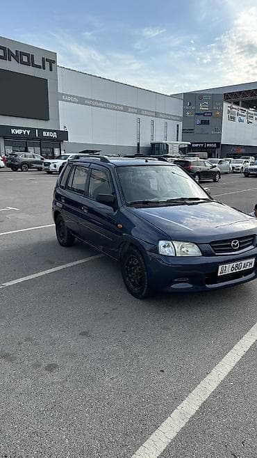Продажа авто: Mazda Demio: 2000 г., 1.3 л, Механика, Бензин, Хэтчбэк — 4