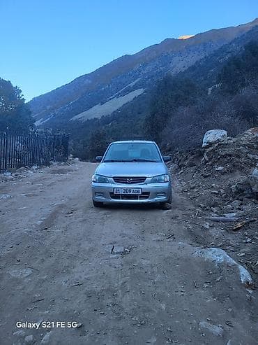 Унаа: Mazda Demio: 2002 г., 1.3 л, Кол менен иштөөчү, Бензин, Хетчбек — 1