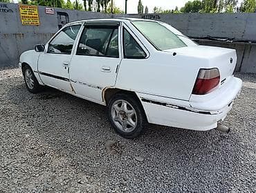 210 mers: Daewoo Nexia: 1996 г., 1.5 л, Механика, Бензин, Седан — 3