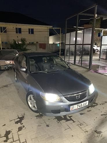 Mazda 323: 2002 г., 1.6 л, Автомат, Бензин, Универсал