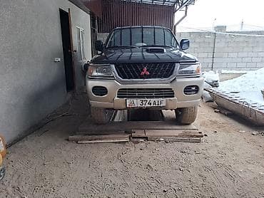 боковой: Mitsubishi Pajero Sport: 2002 г., 2.5 л, Механика, Дизель, Внедорожник — 7