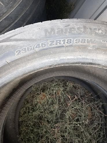 2354018 шина: Один комплект 3000сом. - Размеры: 235/60 R18 и 235/45 ZR18 98W (видно — 3