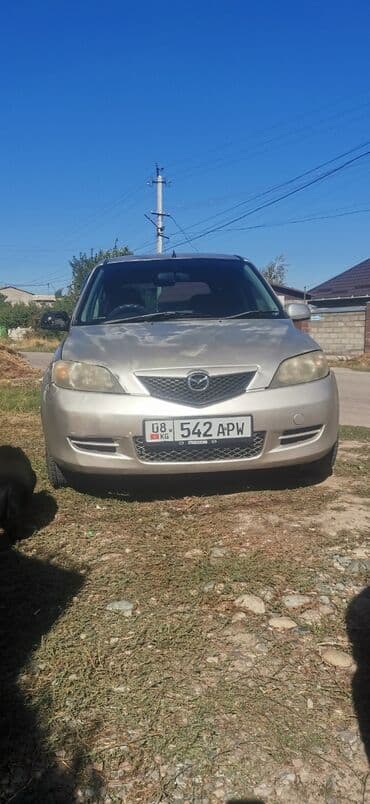 дом на кол: Mazda Demio: 2003 г., 1.3 л, Автомат, Бензин, Хэтчбэк — 1