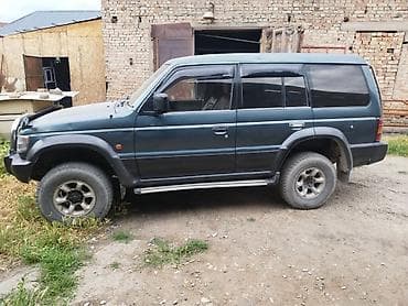 padjero junior: Mitsubishi Pajero: 1994 г., 3 л, Автомат, Бензин, Внедорожник — 7
