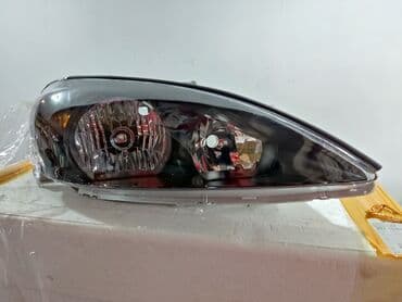 дополнительное освещение на авто: Передняя правая фара Toyota — 1