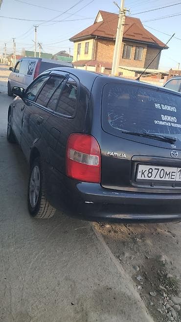 rf 2: Mazda Familia универсал, черный цвет кузова. Кузов: - Универсал — 4