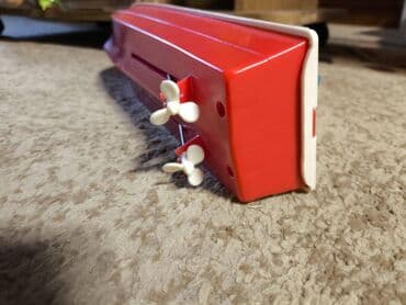 монеты разных стран: Игрушки времен СССР. 1. Детская швейная машинка Катюша. 2. Моторная — 10