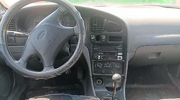 баа: Kia Sephia: 1997 г., 1.6 л, Кол менен иштөөчү, Бензин, Седан — 7