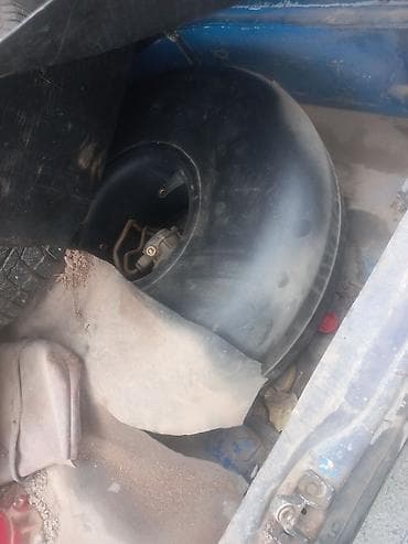 газ для заправки: Баллон ГБО тороидальный для установки в нишу запасного колеса. - Тип — 1