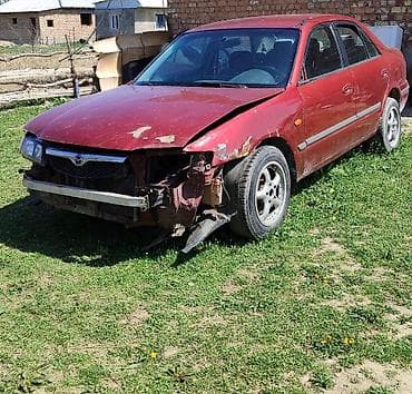 Mazda 323: 1998 г., 1.8 л, Ручные, Бензин, Седан