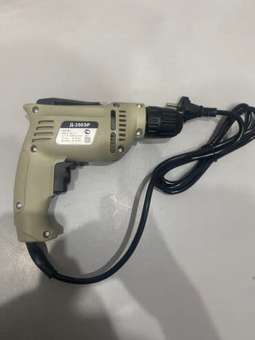 купить перфоратор недорого: Электрическая дрель "ИНТЕРСКОЛ" модели Д-350ЭР, выполненная в бежевом — 3