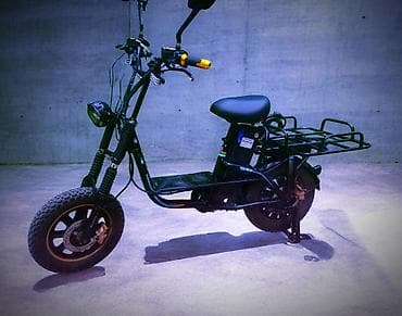 акумлятор: Электроскутер/электромопед с грузовой платформой Описание: - Прочный — 7