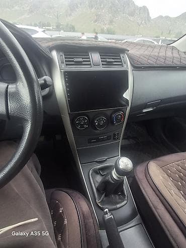 215 65 16 с: Toyota Corolla: 2009 г., Механика, Седан — 4