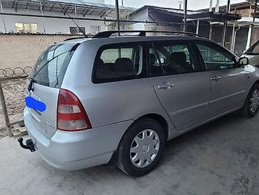 тайота авто: Toyota Corolla: 2003 г., Бензин, Универсал — 3