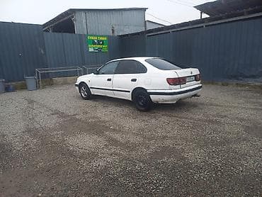 е38 бампер: Toyota Carina E: 1993 г., Бензин, Седан — 6