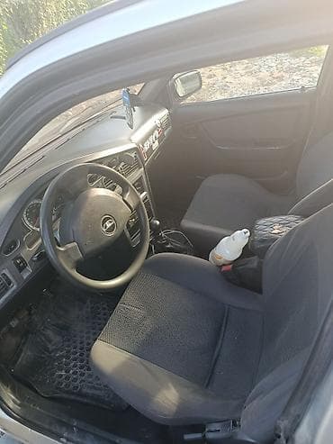 devo matiz: Daewoo Nexia: 2010 г., Механика, Седан — 3