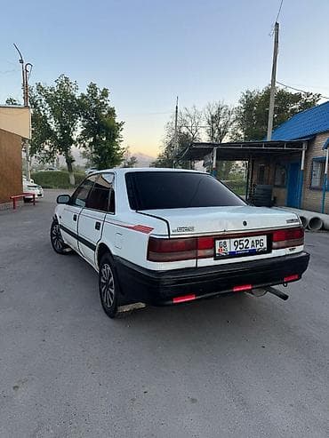 step wgn: Mazda 626: 1990 г., 2 л, Механика, Бензин, Седан — 8