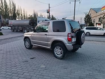 bmw 7 e38: Mitsubishi Pajero iO: 2003 г., 0.7 л, Автомат, Бензин, Внедорожник — 4