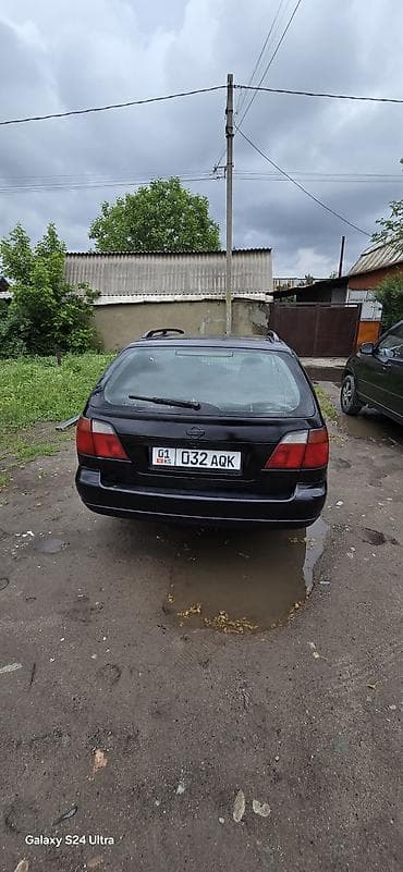 volkswagen 1999: Nissan Primera: 2001 г., Универсал — 5