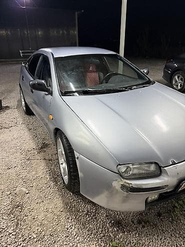 прес ош: Mazda Lantis: 1996 г., 1.5 л, Механика, Бензин, Седан — 5