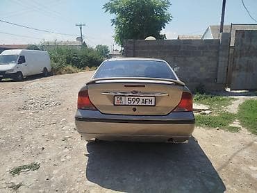 меняю на фит: Ford Focus: 2004 г., 1.6 л, Механика, Бензин, Седан — 1