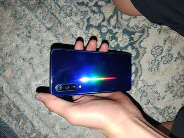 ТВ и видео: Xiaomi, Mi 9 SE, Новый, 64 ГБ, цвет - Синий — 2