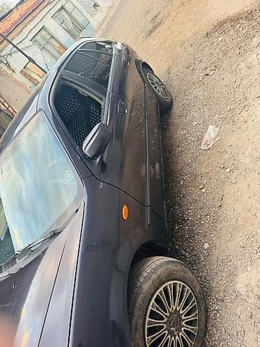bcd com kg: Mazda 323: 2002 г., 1.6 л, Автомат, Бензин, Хэтчбэк — 4