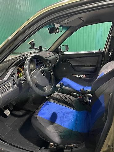 Daewoo Nexia: 2011 г., 1.5 л, Механика, Бензин, Седан