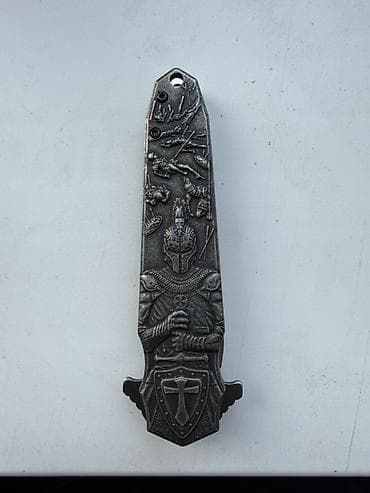 доллар: Декоративный кинжал-нож с тематикой средневековых рыцарей. - Материал — 2
