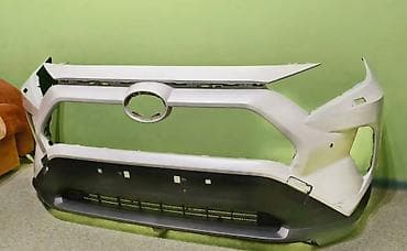 Лючки бензобака: Бампер Toyota — 1