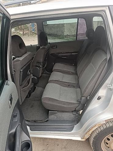 сливной механизм: Mazda PREMACY: 2003 г., 1.8 л, Ручные, Бензин, Универсал — 4