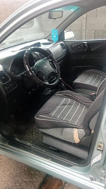 митсубиси спайс стар: Mitsubishi Space Star: 2003 г., 1.8 л, Ручные, Бензин, Хэтчбэк — 5