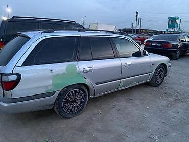 626: Mazda 626: 1998 г., 1.8 л, Ручные, Бензин, Универсал — 7