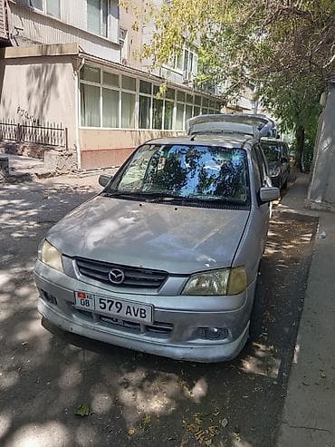 Mazda Demio: 2001 г., 1.5 л, Автомат, Бензин, Хэтчбэк — 1