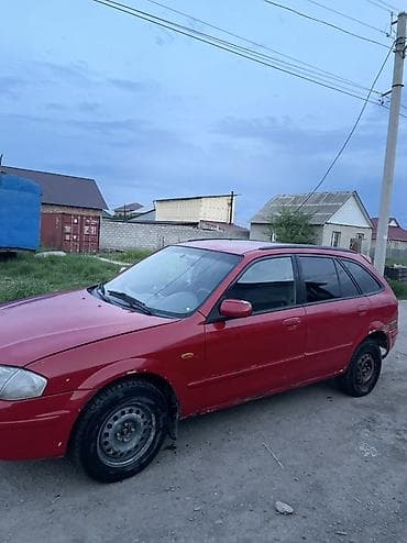 хонда истеп 1: Mazda Familia: 1999 г., 1.5 л, Кол менен иштөөчү, Бензин, Универсал — 3